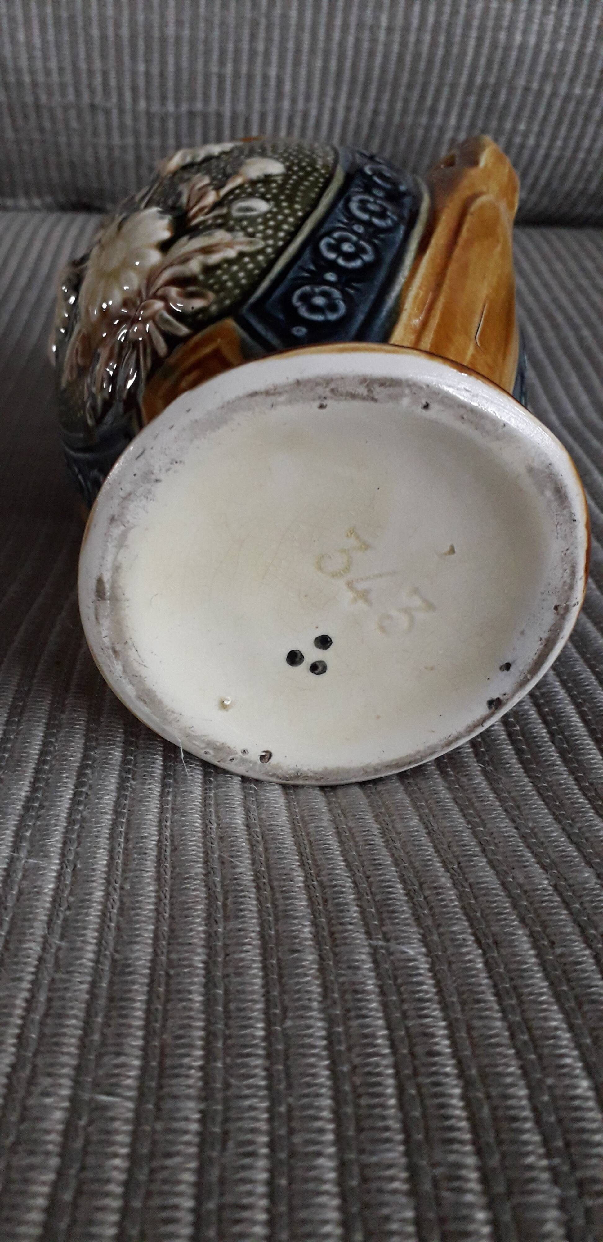 Vintage slip vase with floral decoration