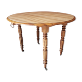 Old round table in walnut with flaps Louis Philippe