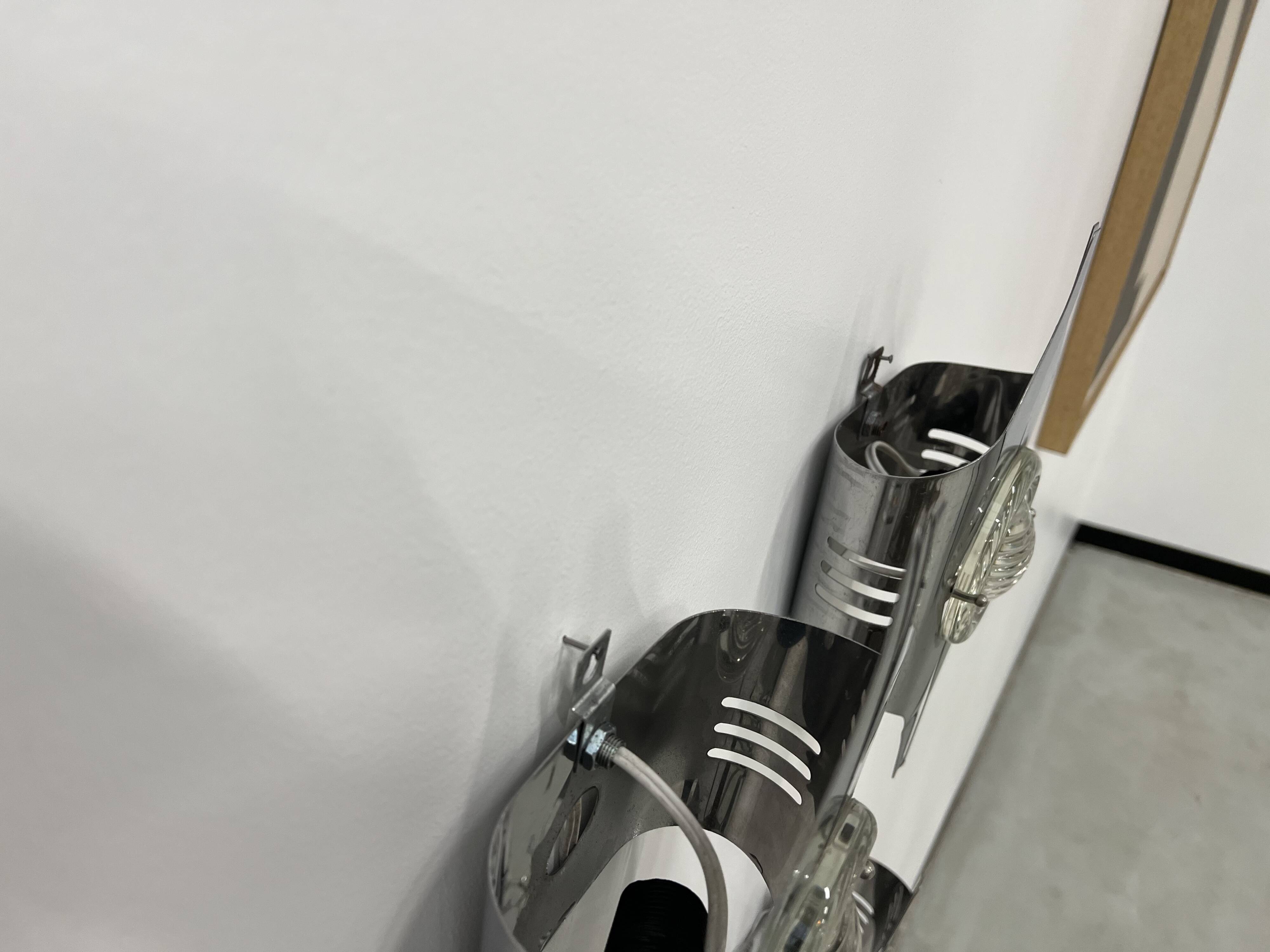 Wall lights by Oscar Torlasco