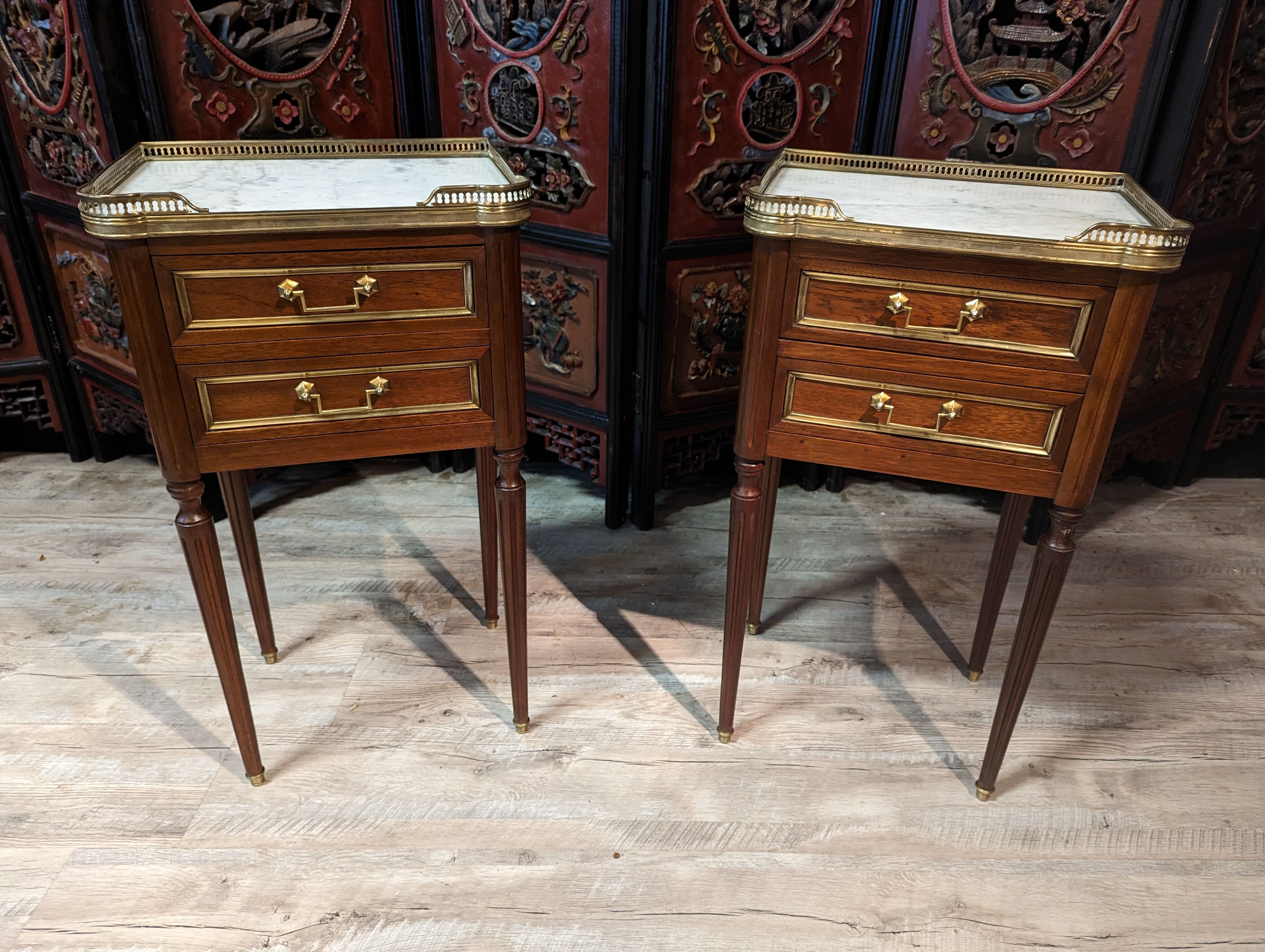 Pair of Louis XVI style bedside tables in mahogany