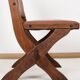 Pair of brutalist style chairs, in wood and leather.