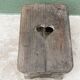 Wooden footrest, heart cutout