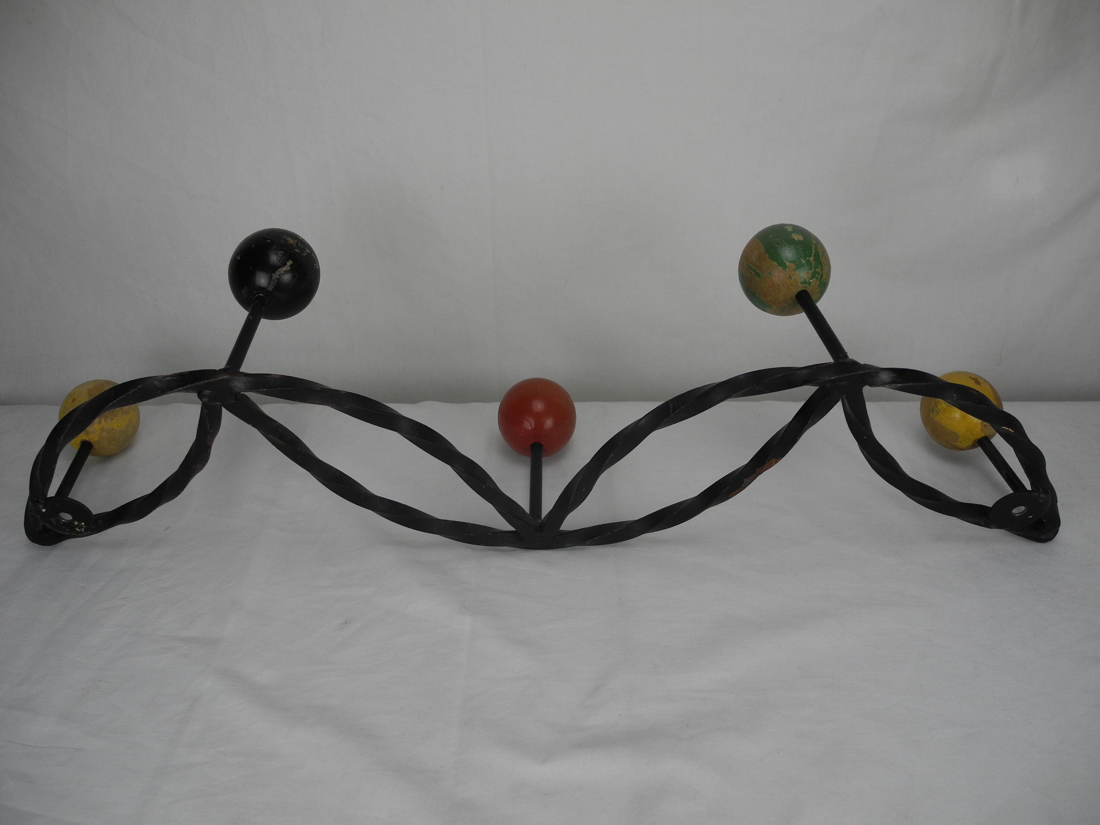 Old wrought iron coat rack