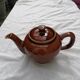 Théière et pots à lait en céramique marron