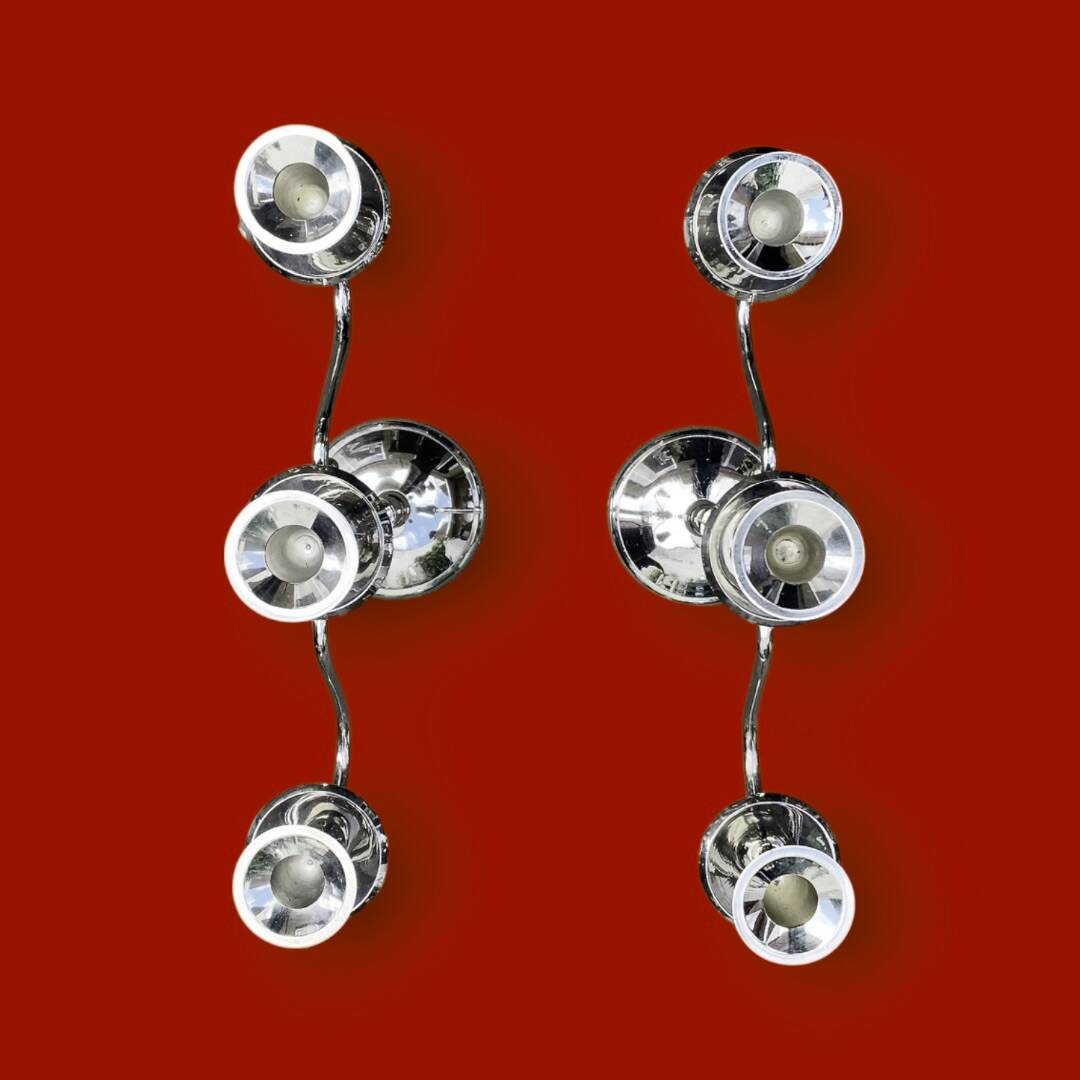 Pair of vintage three-armed chrome metal candlesticks