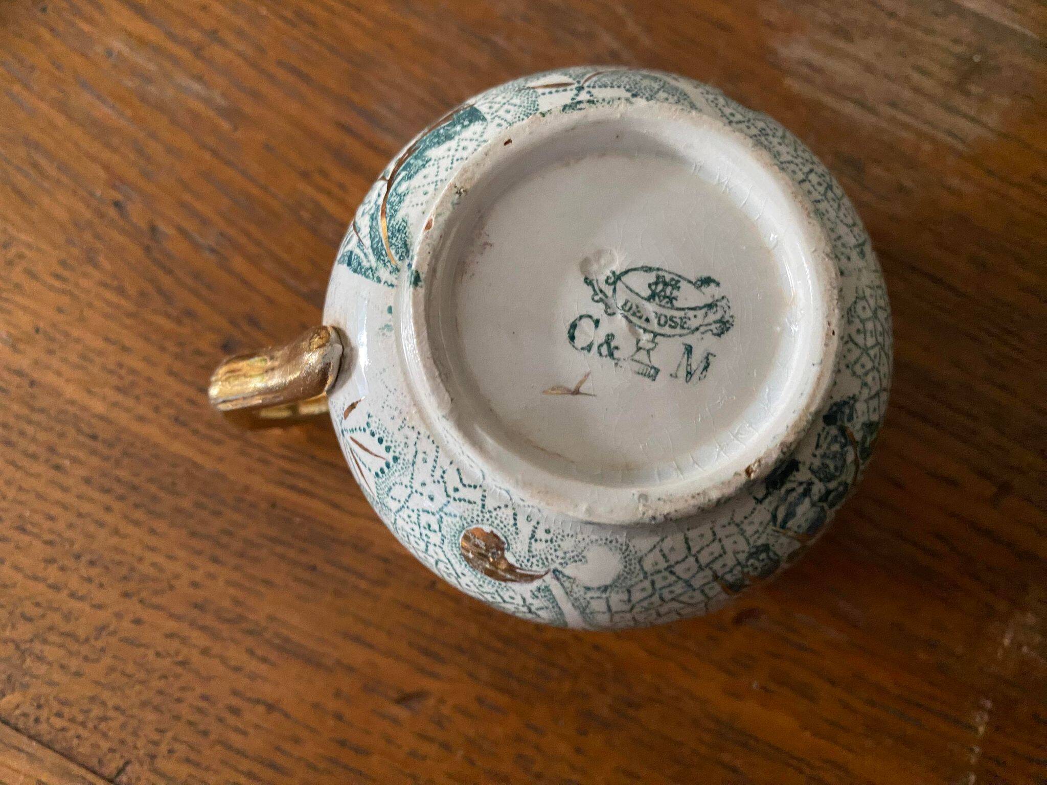 Creil et Montereau cup and saucer green and gold floral pattern