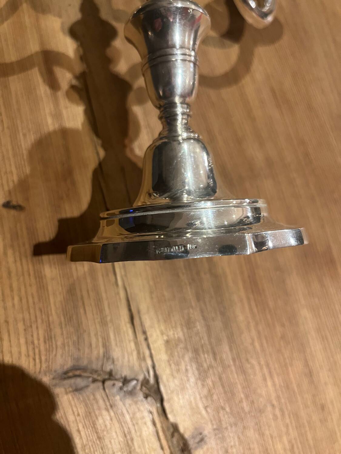 Pair of candelabra, three silver-plated metal lights
