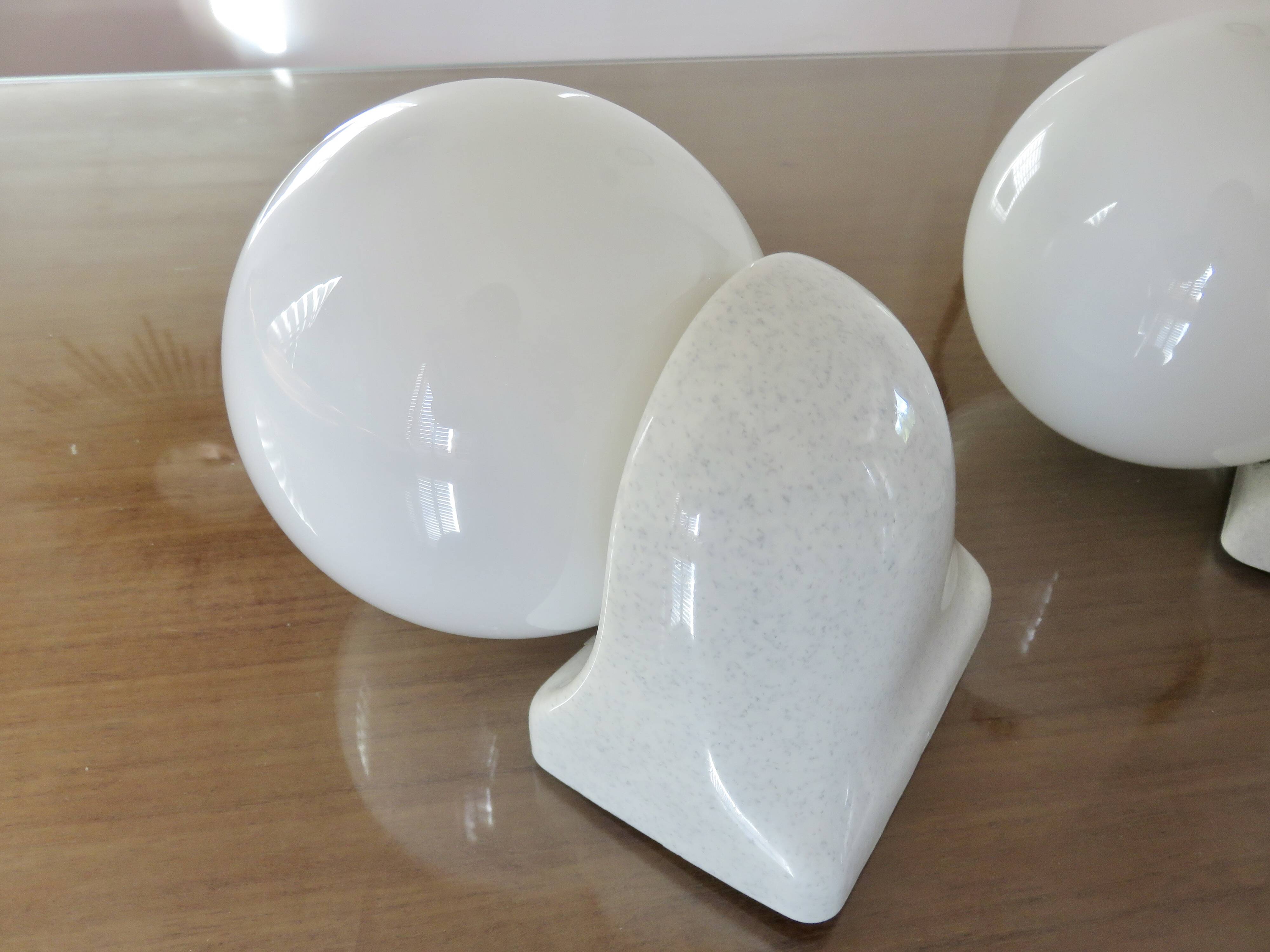 Pair of streamline opaline wall lights from the 80s