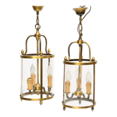Pair of lanterns with three lights in gilded metal and glass