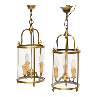 Paire de lanternes à trois lumières en métal doré et verre