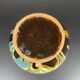 Black ball vase with handle, yellow blue marbled