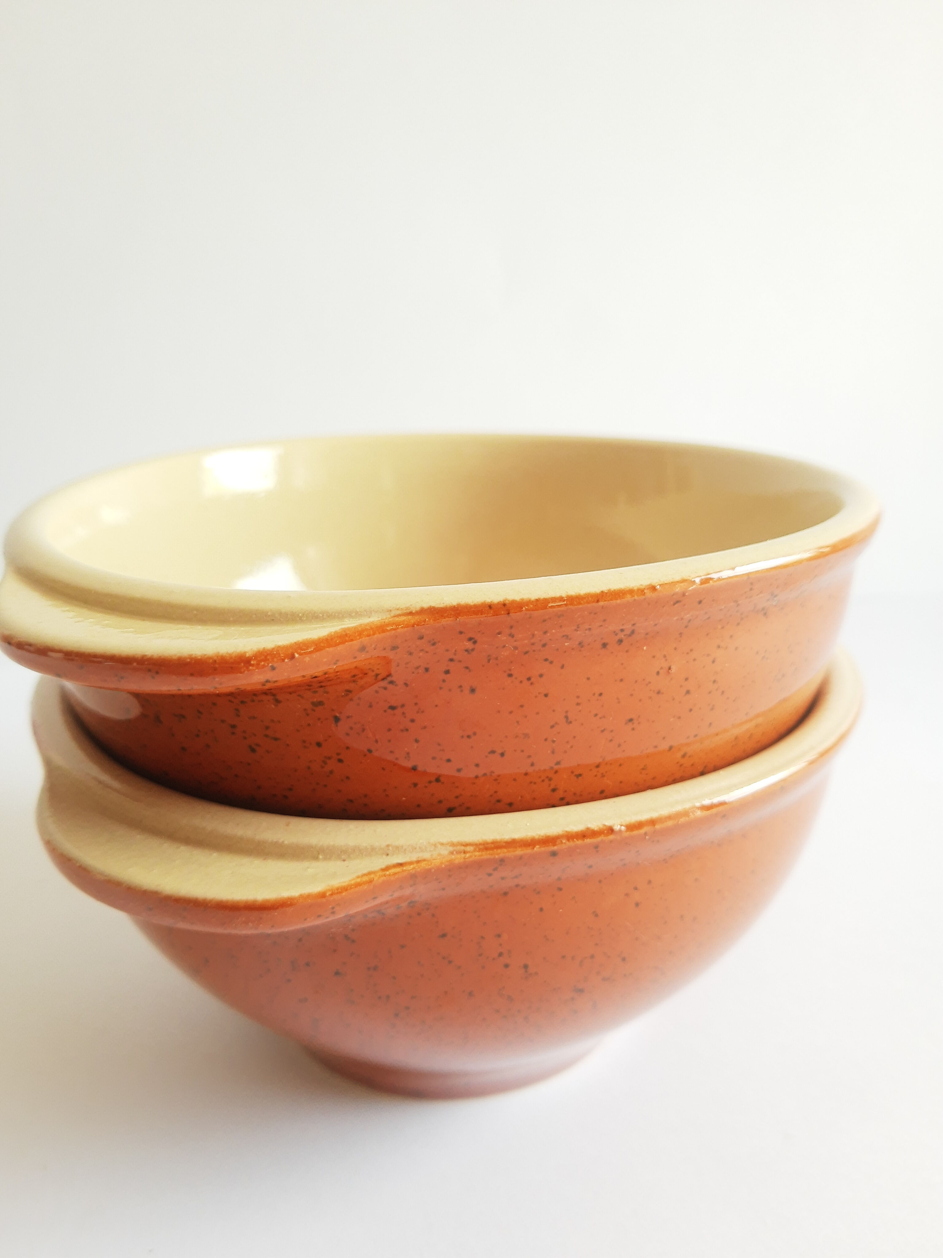 Duo of vintage Emile Henry cognac ear bowls