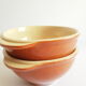 Duo of vintage Emile Henry cognac ear bowls