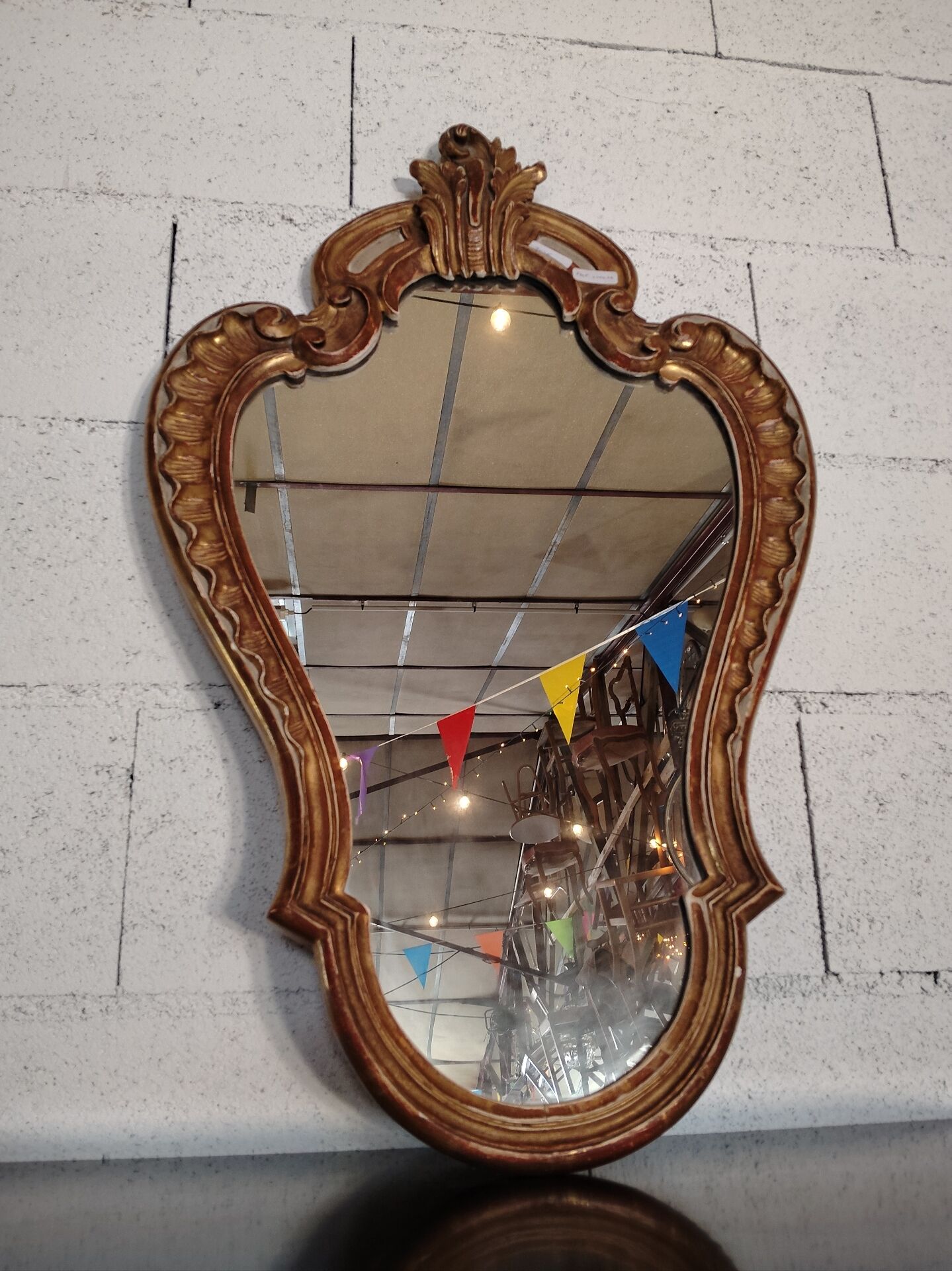 Rococo Style Mirror in Gilded Wood with Sculpted Pediment