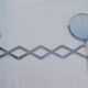 Vintage metal accordion wall mirror