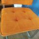Pair of vintage cantilever chairs in chrome and orange corduroy.
