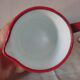 Enamelled metal pourer
