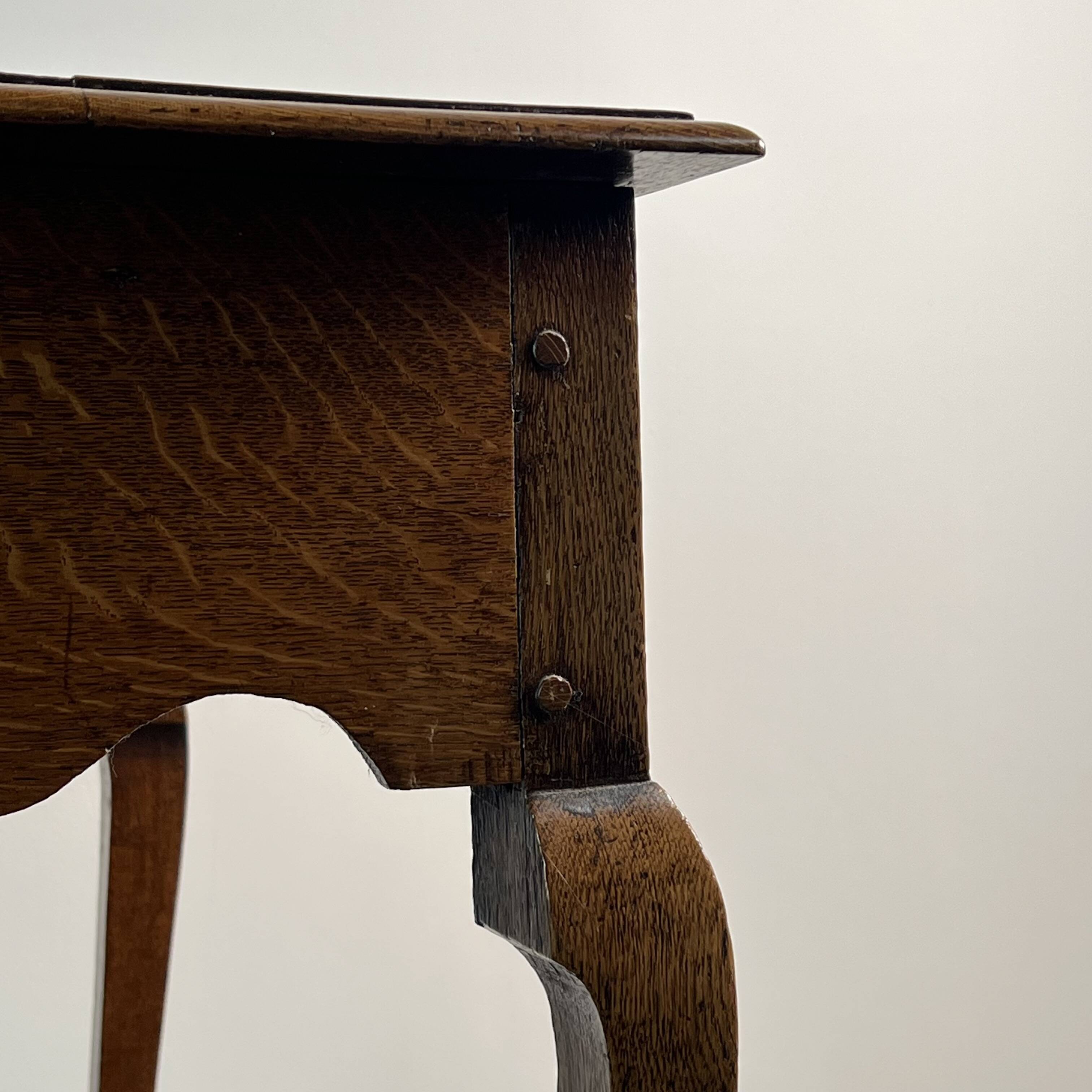 Queen Anne Low-Boy side table in oak, England, 18th century.