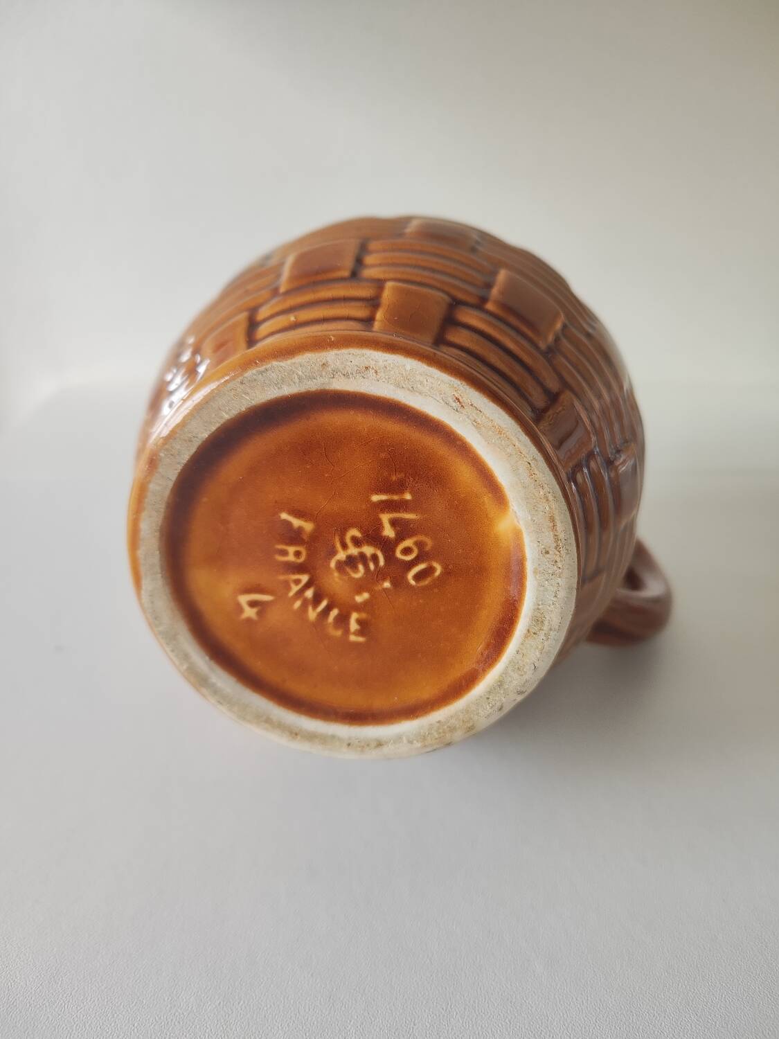 Caramel brown pitcher in glazed ceramic with barbotine finish from the 60s