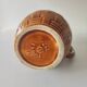 Caramel brown pitcher in glazed ceramic with barbotine finish from the 60s