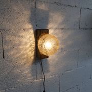 1960s ball wall light in dark wood and amber glass