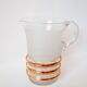 set composed of a pitcher and two large white granite glasses with gold edging from the 60s