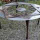 Outdoor iron table with yin yang decoration