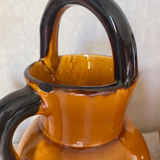 Enameled jugs signed Gomares