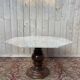 Table octogonale plateau marbre et pied en bois