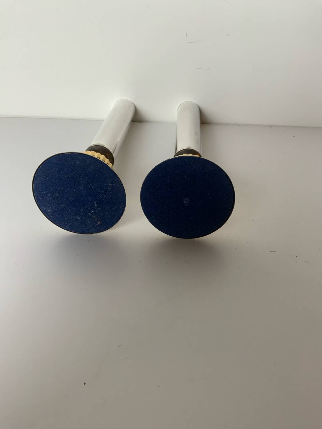 Pair of metal candlesticks