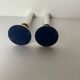 Pair of metal candlesticks