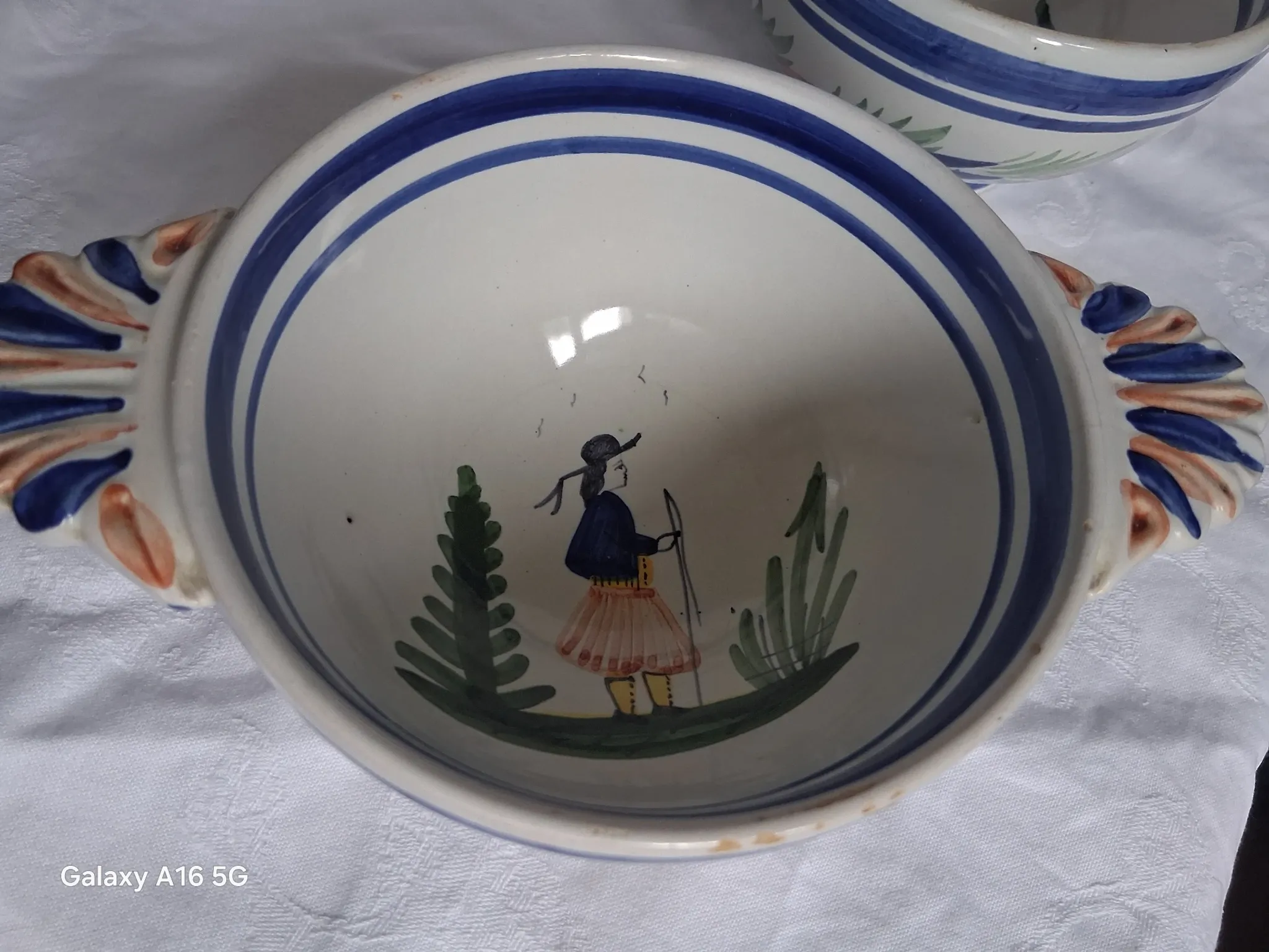 Set of three antique earthenware bowls from HB Quimper, signed.