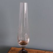 Cut glass soliflore vase with a smoked glass base.
