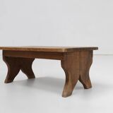Small rustic wooden stool with curved base, France ca. 1900