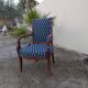 Empire style armchair reupholstered