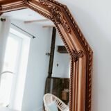 Golden mirror with moldings