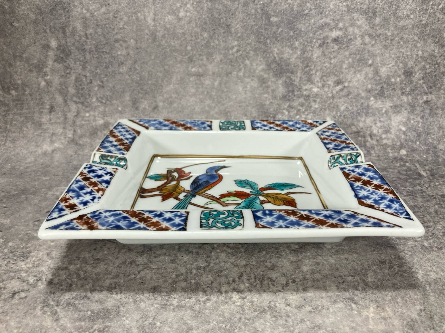 Ashtray. Trinket dish. Japanese porcelain. Blue bird on an autumn branch
