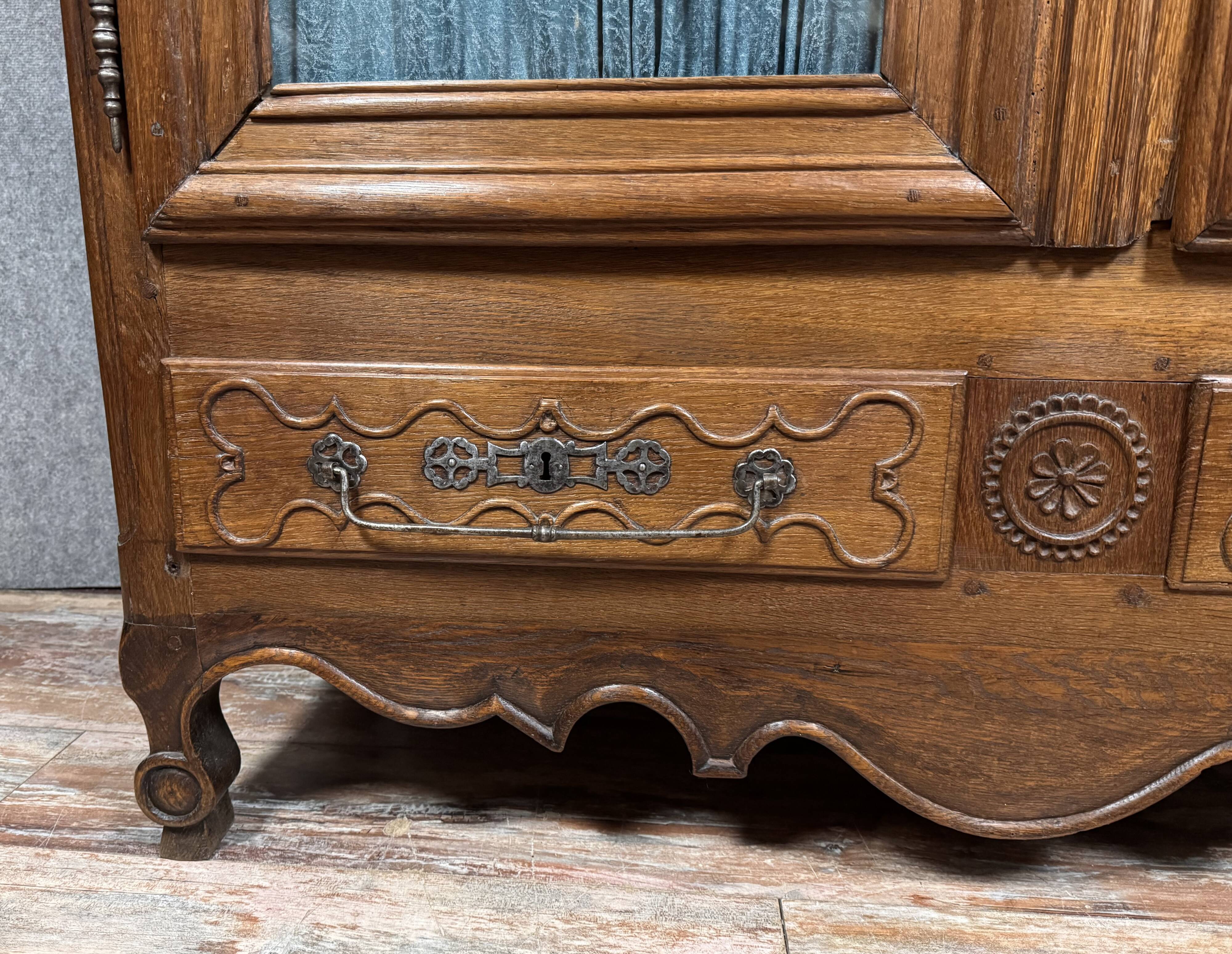Louis XV period bookcase in solid oak circa 1750