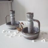 Pair of speckled sandstone candle holders