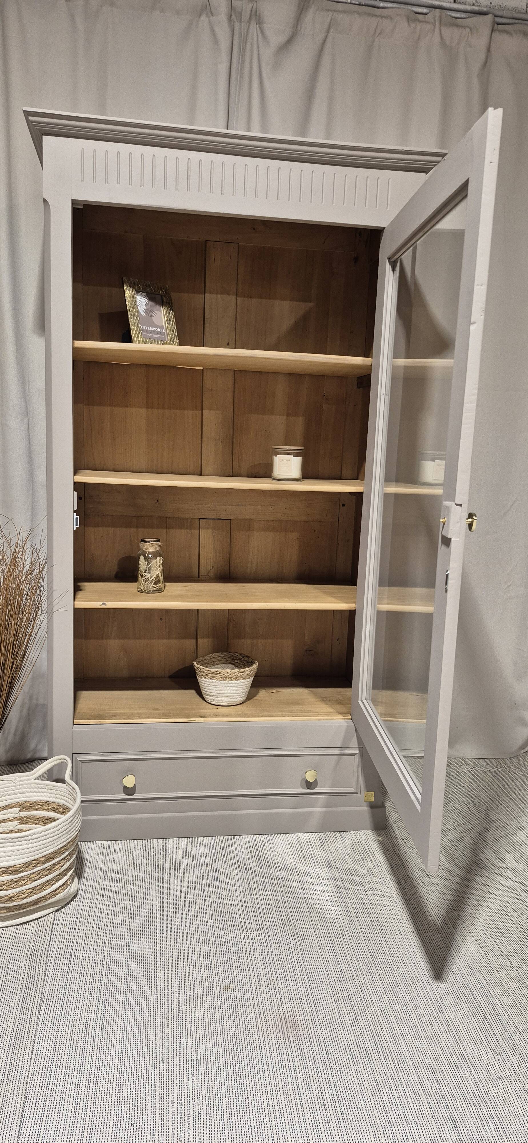 Glass display cabinet with drawer