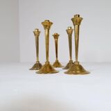 Mid-century set of 5 brass candlesticks by Lars Holmström, Arvika, Sweden.