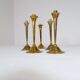 Mid-century set of 5 brass candlesticks by Lars Holmström, Arvika, Sweden.