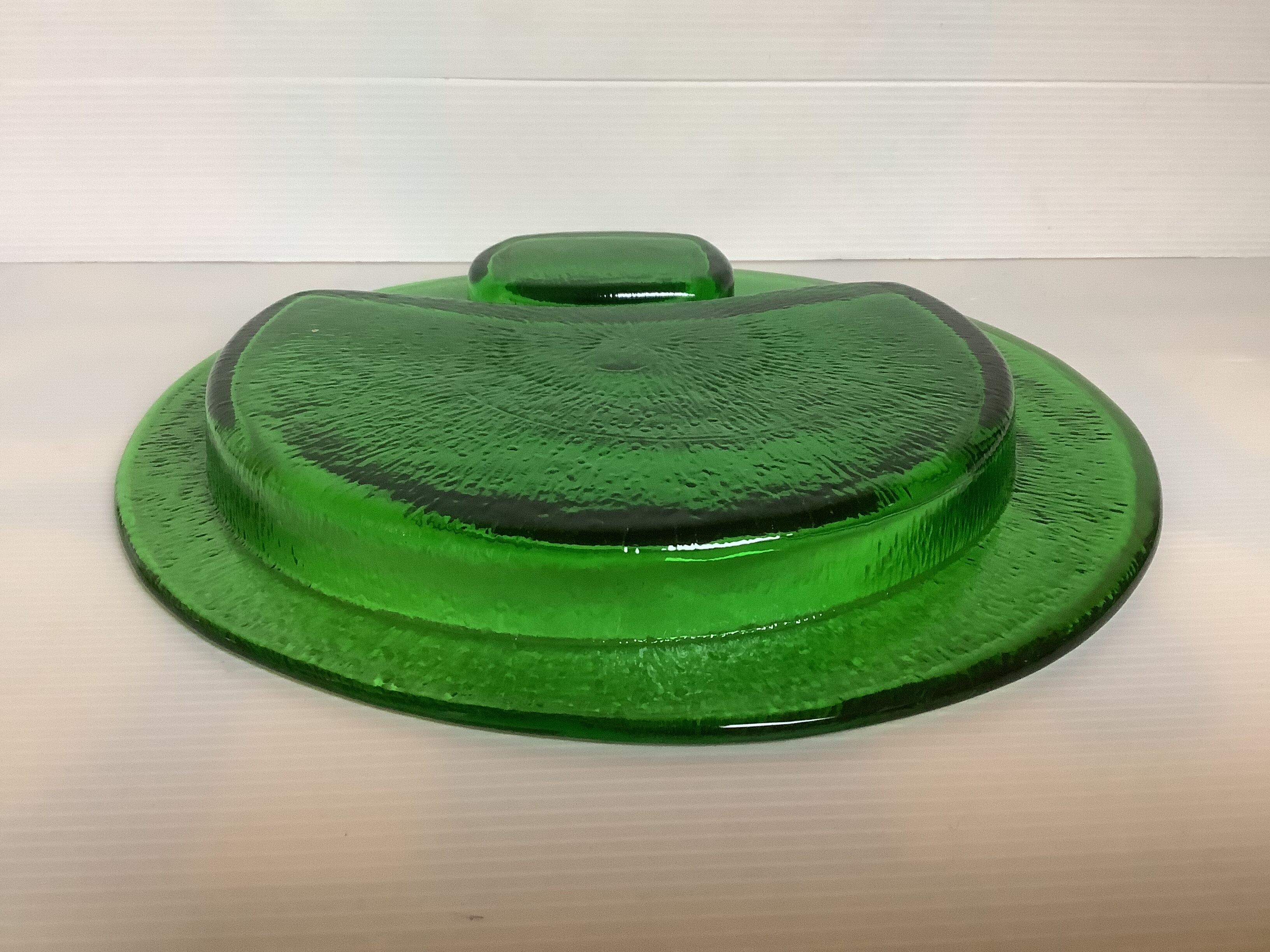 Handcrafted thick green glass empty pocket