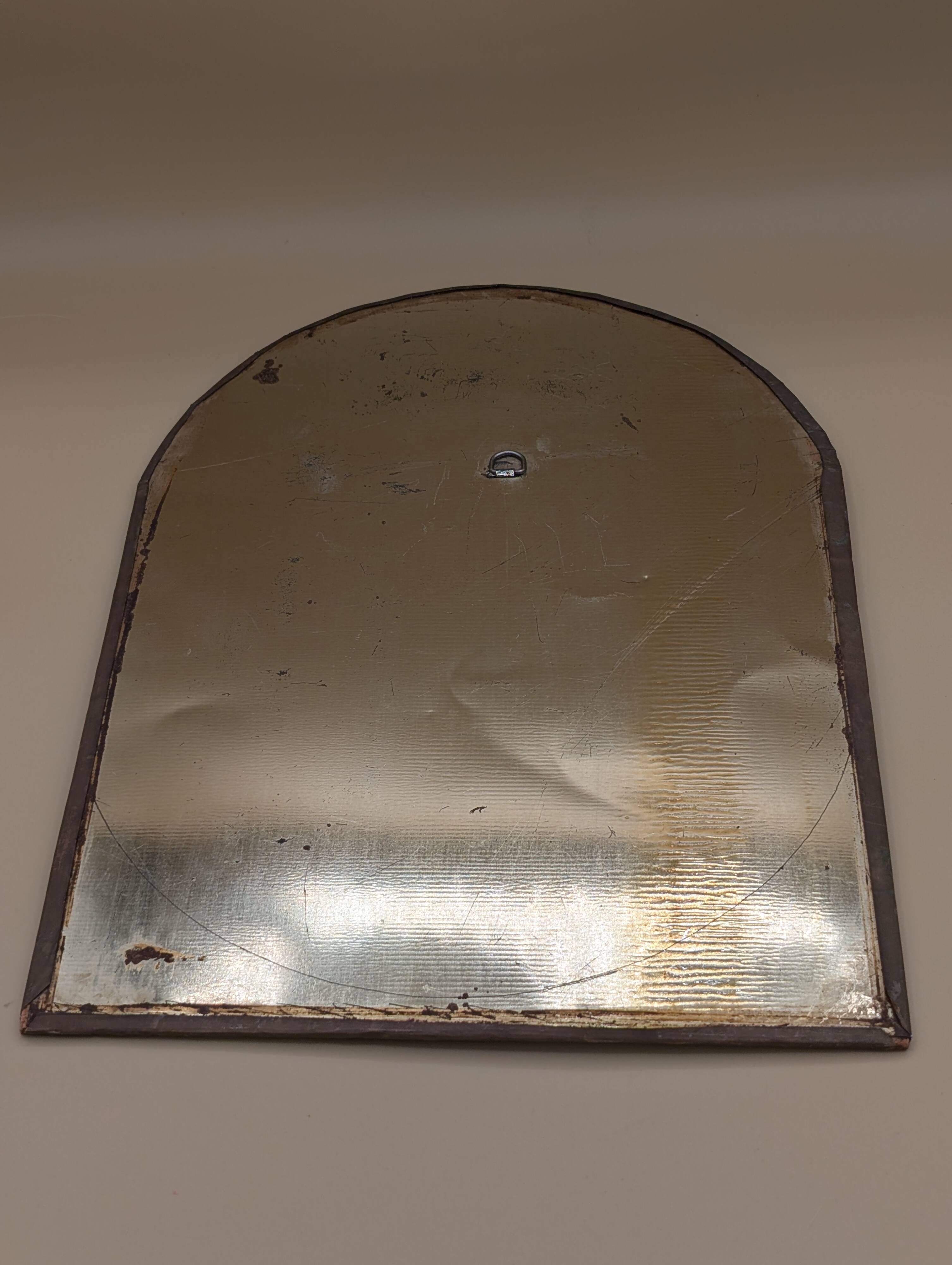 Miroir ancien doré à décor sculpté de style ethnique