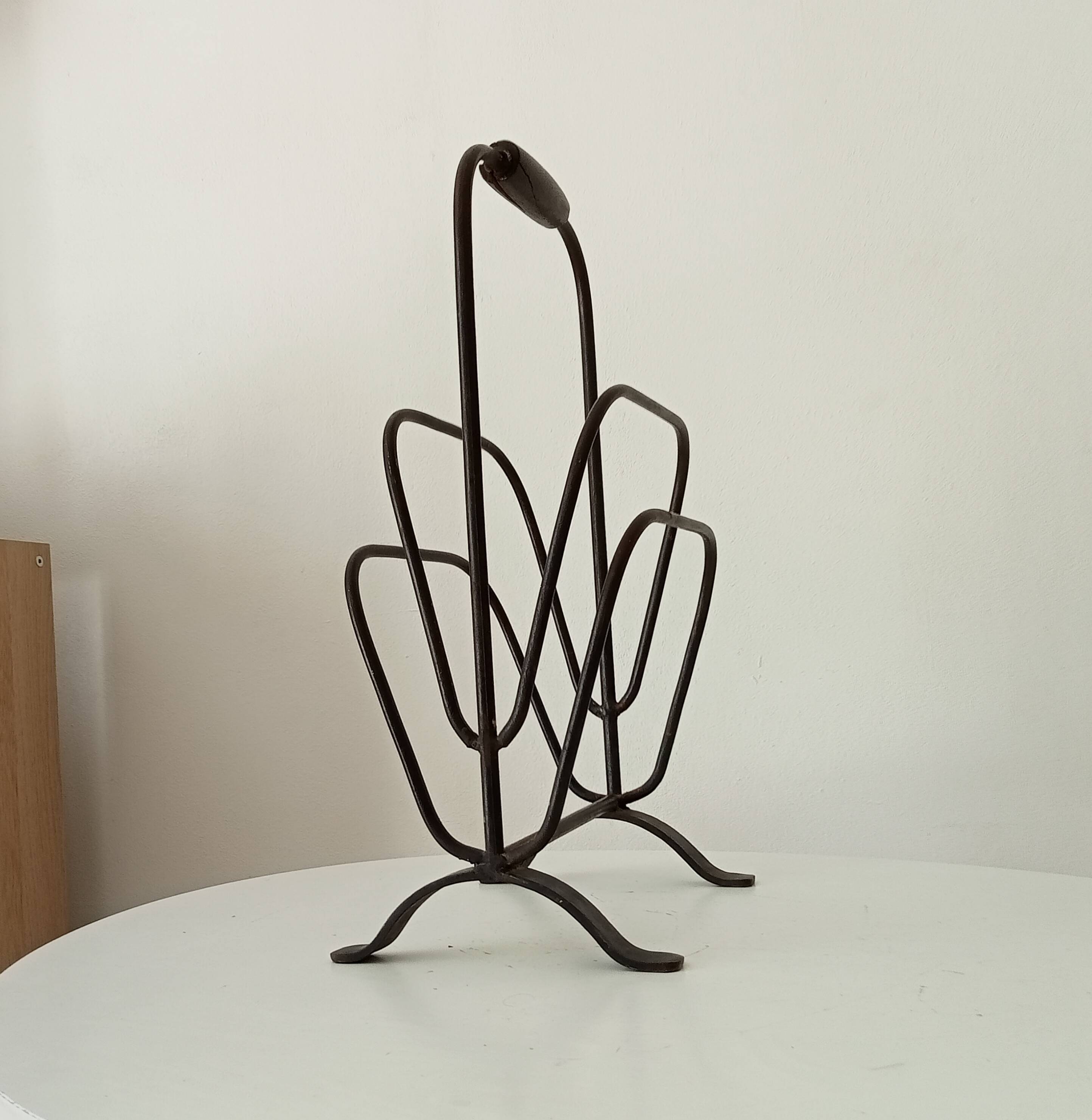 Brutalist wrought iron magazine rack from the 1960s.