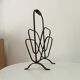 Brutalist wrought iron magazine rack from the 1960s.