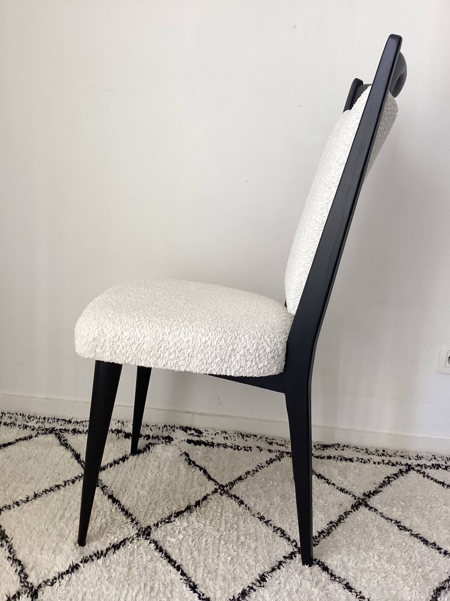 Fully restored vintage chair in boucle fabric.
