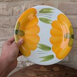 Round serving dish with hand-painted yellow flowers in ceramic TC Italy.