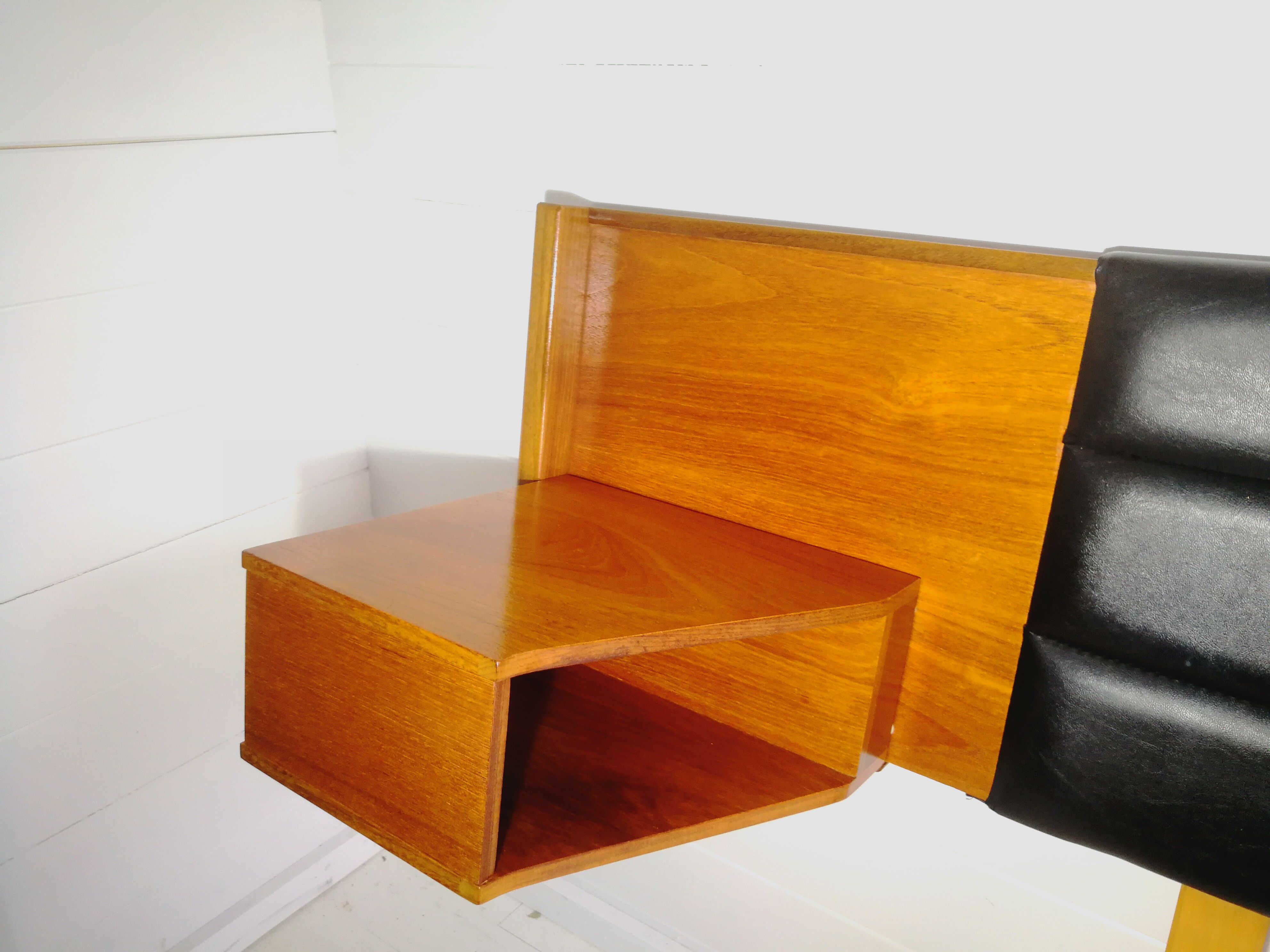 Mid century 1970s retro teak headboard with two hinged bedsides, upholstered in black by 'slumberlan