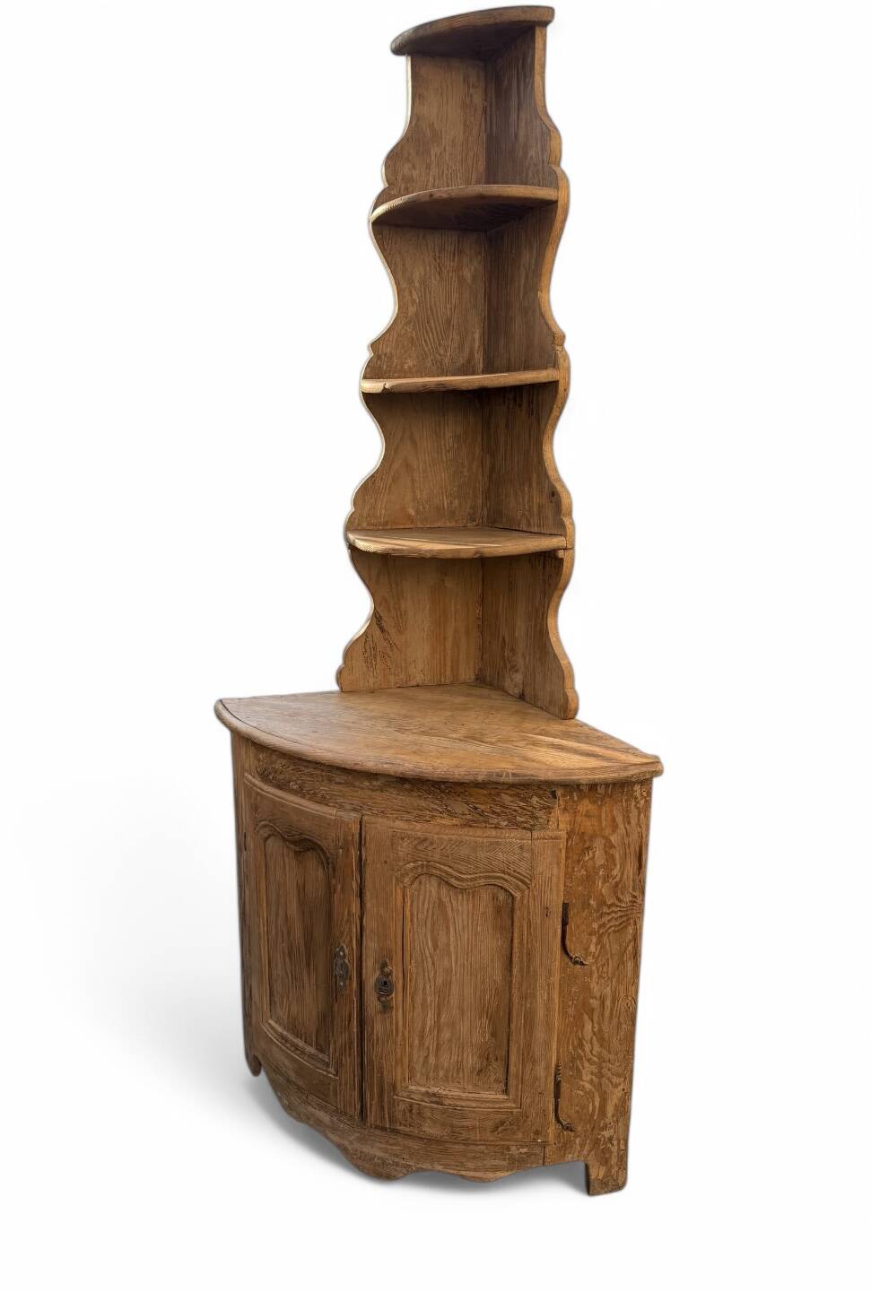 19th-century patinated pine corner buffet from England with shelves.